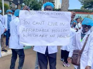 Kenyan graduate medical students with placards (photo courtesy)